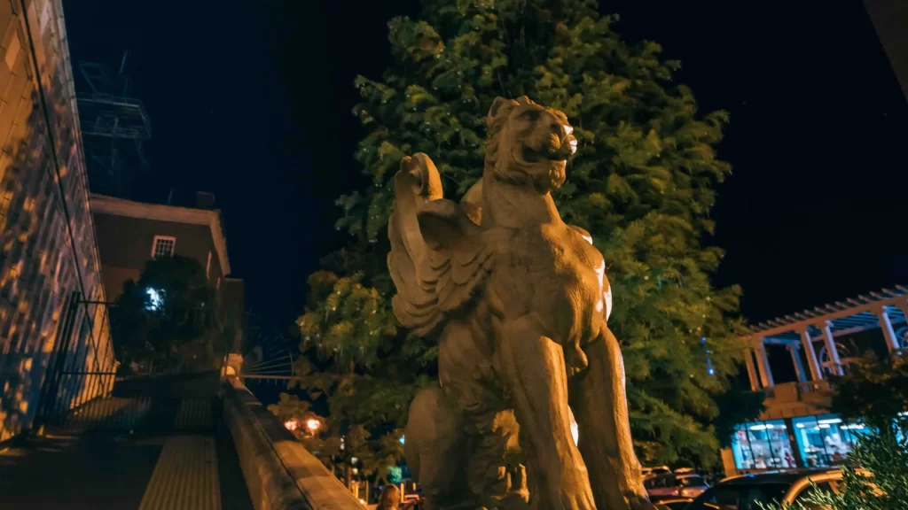 A statue of a lion with wings